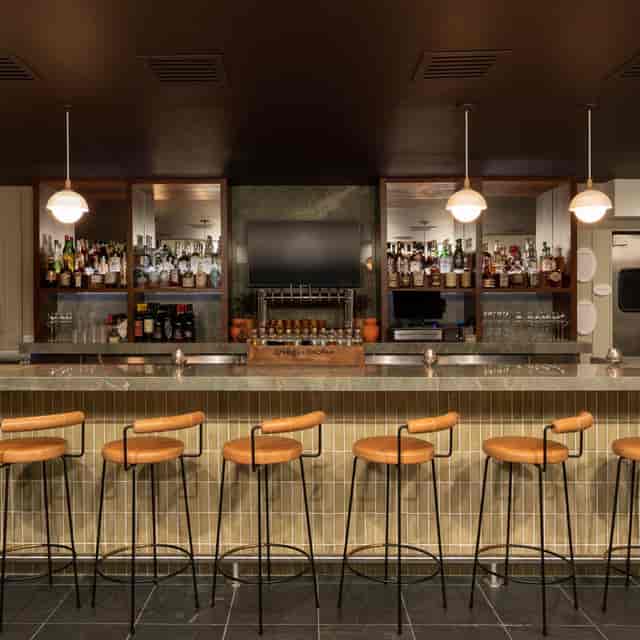 Modern bar at The Pearl Hotel, ideal for networking events and cocktail receptions.