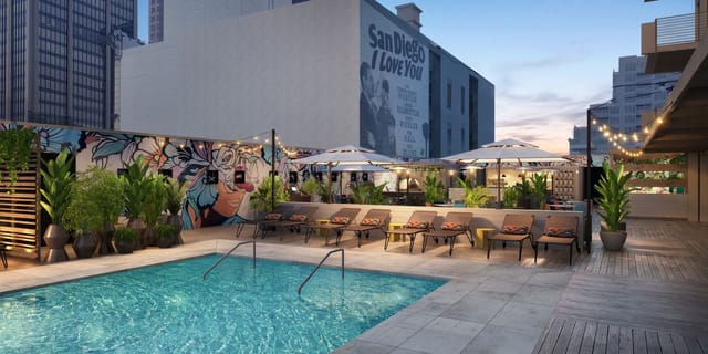 Stylish rooftop venue with pool at Kimpton Alma Hotel for events and gatherings.