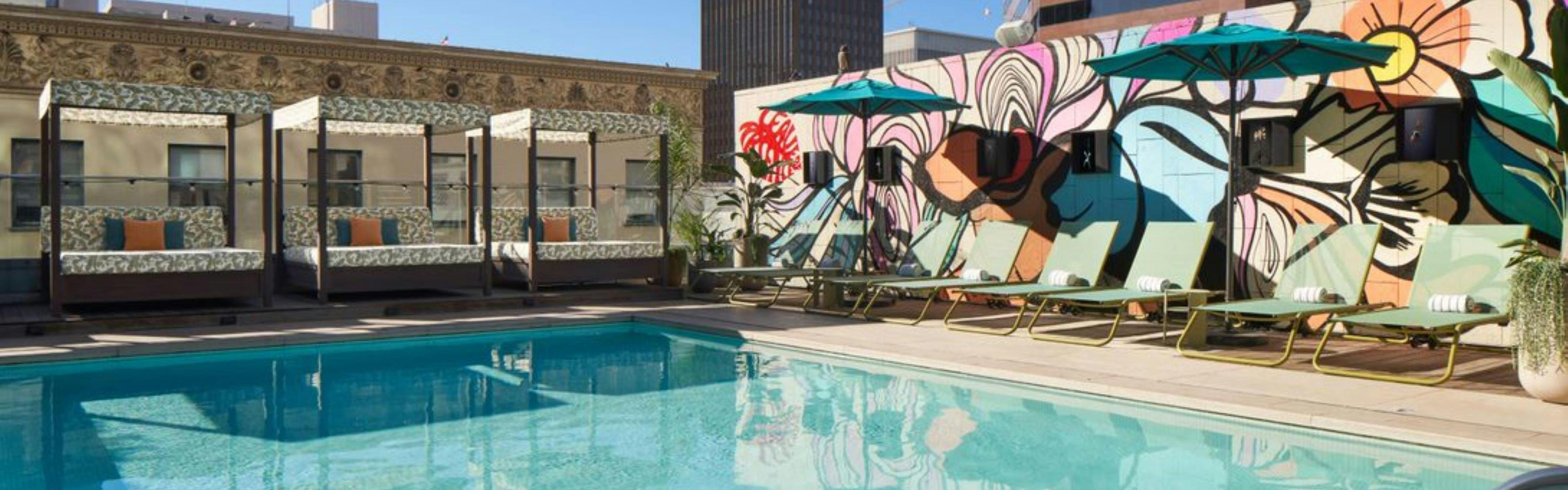 Carmen at Kimpton Alma Hotel rooftop pool, ideal for summer networking events.