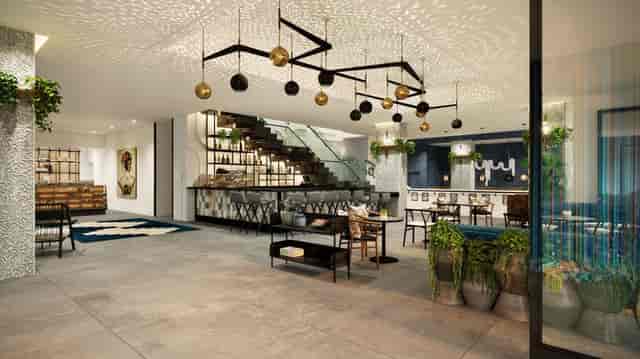 Modern event space in Kimpton Alma Hotel lobby with stylish decor and natural light.