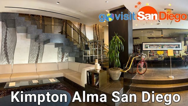 Stylish Kimpton Alma Hotel lobby with modern decor, perfect for networking events.