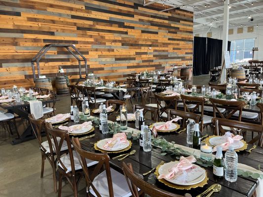 Rustic wedding ceremony setup with elegant table settings at Salt Drift Pointe.