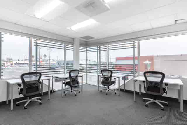 Modern meeting space at Regus Hermosa Beach with ergonomic chairs for workshops.
