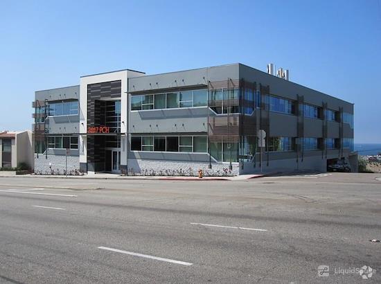 Modern meeting rooms with large windows at 2447 Pacific Coast Highway for events.