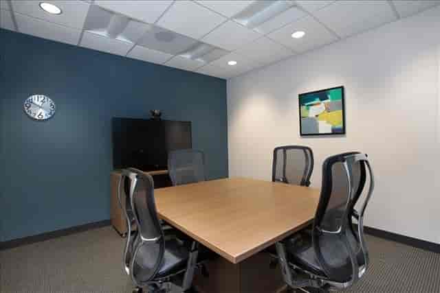 Modern conference room with ergonomic chairs for efficient meetings at 2447 Pacific Coast Highway.