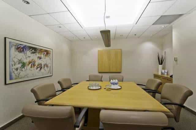 Emerald Plaza Suite 400 meeting room with spacious table, ideal for professional gatherings.