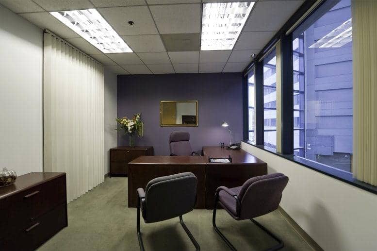 Minimalist office space in Suite 400, Emerald Plaza for meetings and consultations.