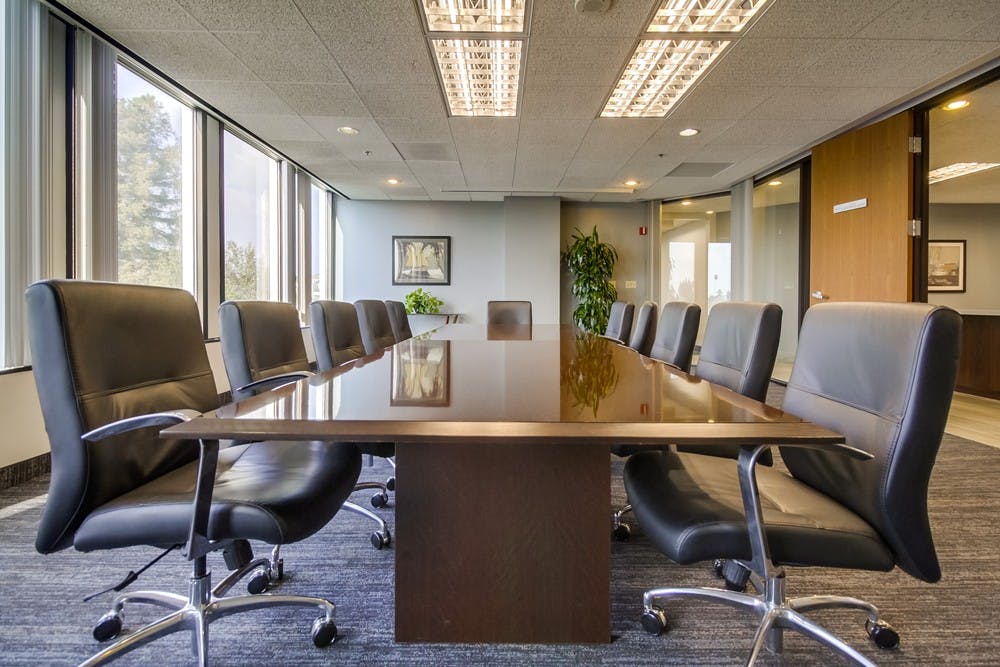 Modern conference room with ergonomic chairs at Lake Avenue Executive Suites, Pasadena.