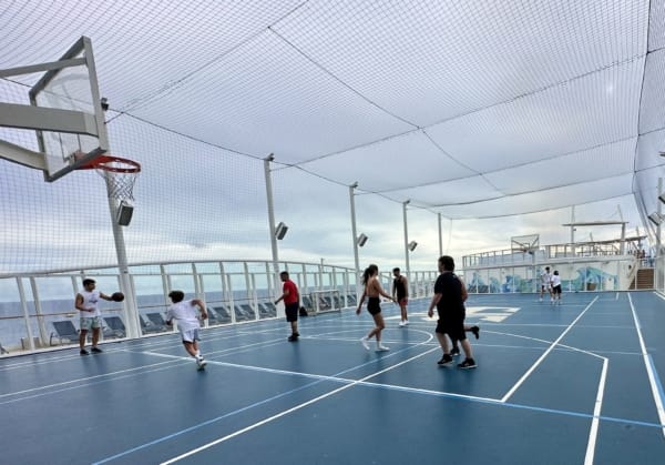 Outdoor basketball court on cruise ship, perfect for team-building and recreational events.