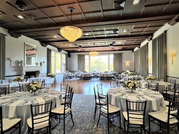 Elegant ballroom with chandeliers, perfect for weddings and corporate events.