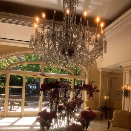 Elegant Terrace Restaurant with chandelier, ideal for upscale events in Pasadena.