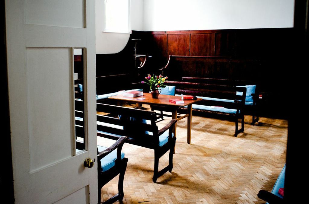 Large Meeting Room in Brentford Quaker House, ideal for workshops and discussions. - Banner