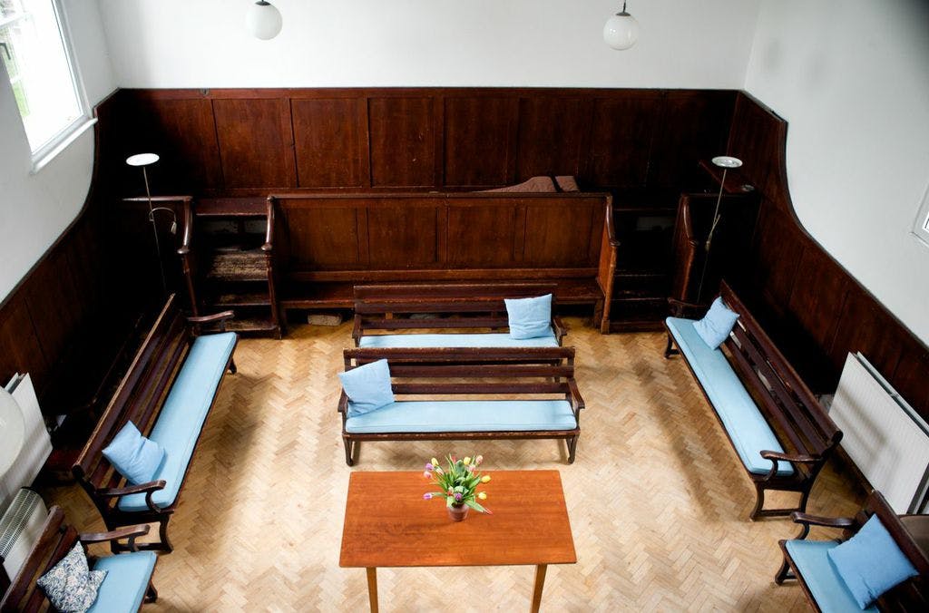 Large Meeting Room at Brentford Quaker House, cozy space for workshops and gatherings.