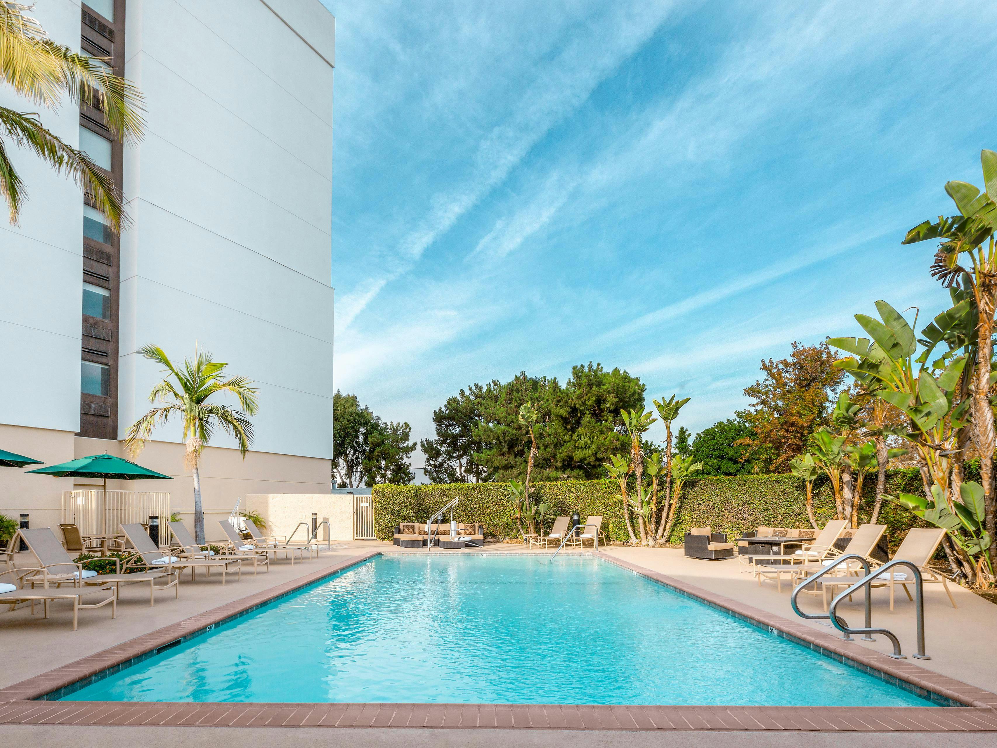 Serene pool area at Holiday Inn La Mirada, ideal for networking events and relaxation.