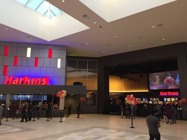 Harkins Theatres Cerritos 16 lobby with vibrant decor, ideal for private screenings and events.