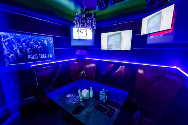 Private karaoke rooms in XPRESS NIGHT CLUB with sleek decor for intimate events.