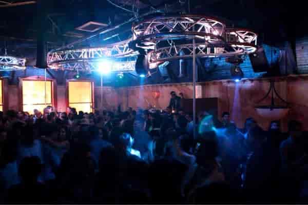 Vibrant Club 54 Lounge with packed dance floor, perfect for nightlife events and celebrations.