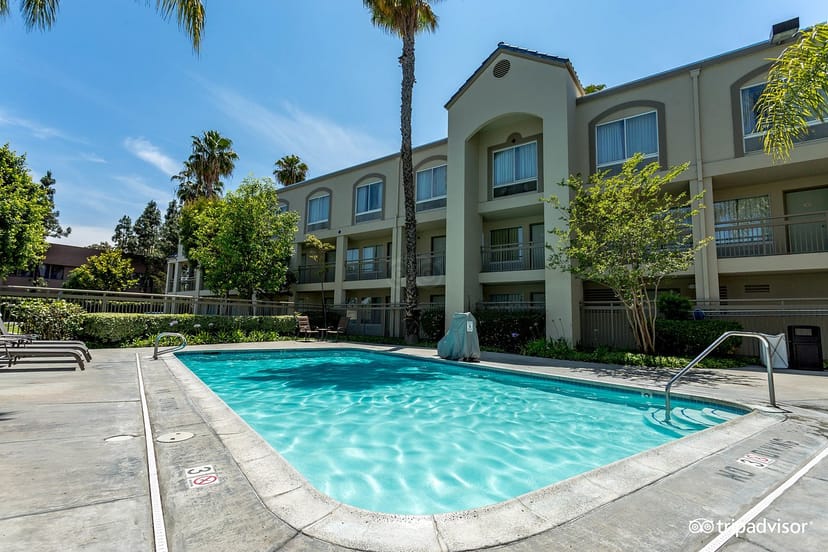 Outdoor pool at Good Nite Inn Buena Park, ideal for networking events and relaxation.