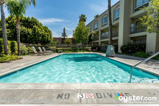 Outdoor pool at Good Nite Inn Buena Park, ideal for networking events and casual gatherings.