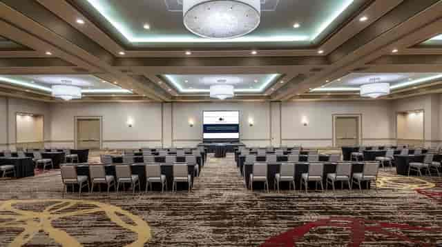 Classic Room at DoubleTree Norwalk with chairs for corporate meetings and social events.