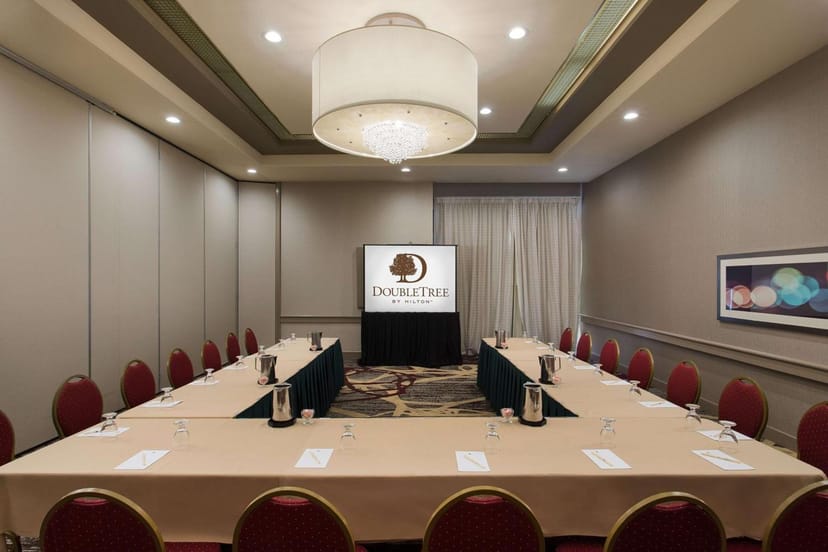 Classic meeting room with U-shaped table for corporate events at DoubleTree Norwalk.