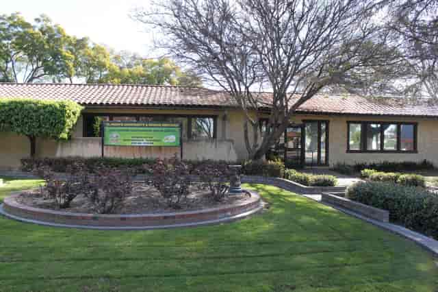 Large Stage at El Monte City Hall, ideal venue for meetings and events with landscaped garden.