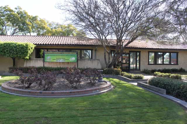 Large Stage at El Monte City Hall, ideal venue for meetings and events with landscaped garden.