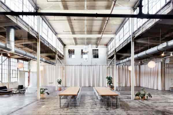 Spacious industrial bar and lounge in Frankie LA, perfect for events and meetings.
