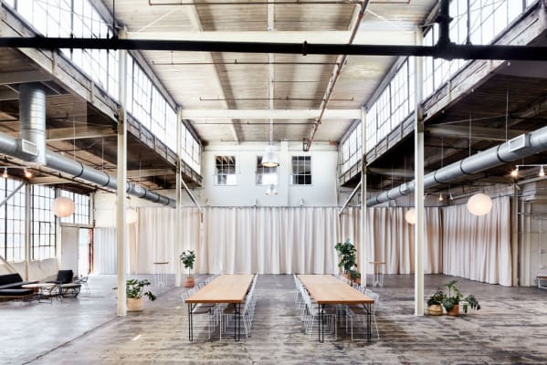 Spacious industrial bar and lounge in Frankie LA, perfect for events and meetings.
