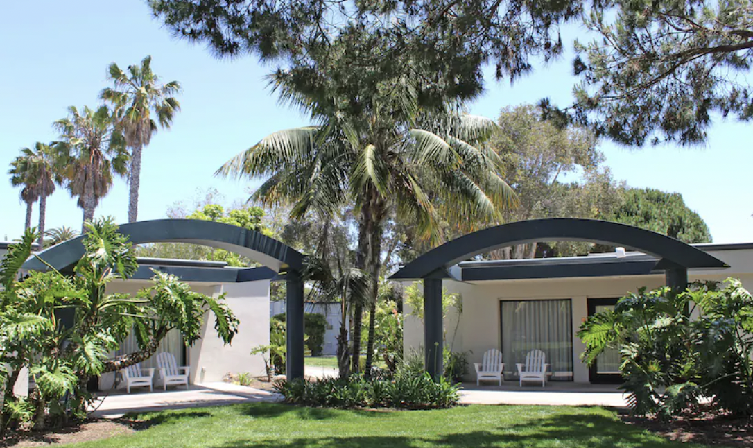 Serene Garden Room venue with lush landscaping for meetings and events.
