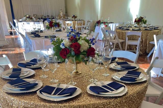 Elegant Affair Wedding Venue Suite A with gold tablecloths, ideal for weddings and formal events.