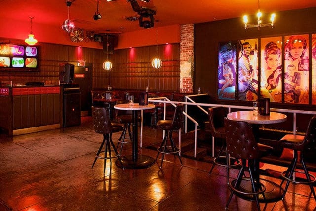 Vibrant air-conditioned lounge with retro decor for themed events and social mixers.