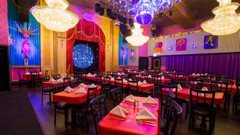 Vibrant event venue in San Diego with elegant chandeliers for banquets and performances.