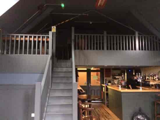 Cozy Mezzanine at The Railway Inn, perfect for intimate meetings and casual events.