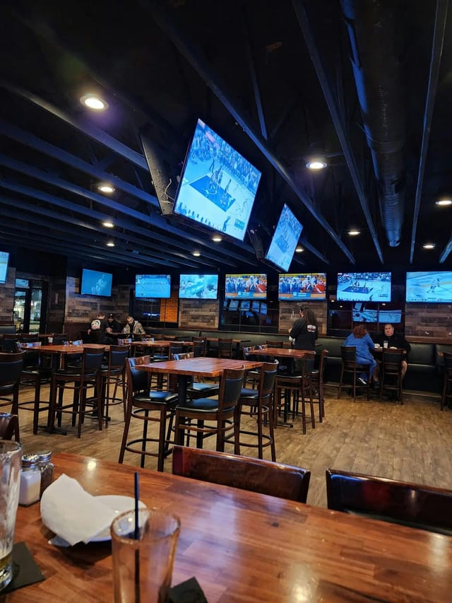Spacious Scripps venue with large screens for sports watch parties and casual gatherings.