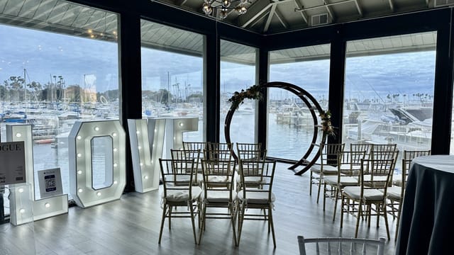 Canvas Creative Space with waterfront view, elegant seating for weddings and events.