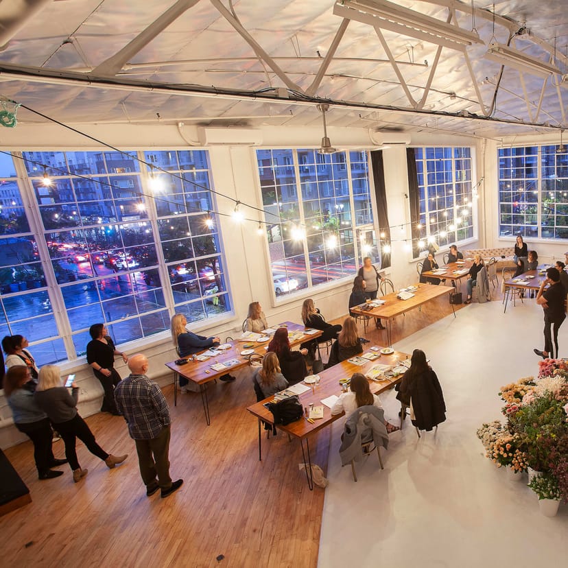 Canvas Creative Space with cityscape view, perfect for networking events and gatherings.