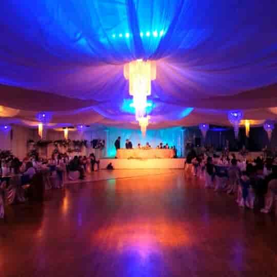 Elegant Fiesta Hall with drapery, perfect for weddings and formal events.