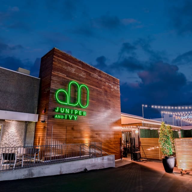 Modern covered patio at Juniper & Ivy with string lights for events and gatherings.