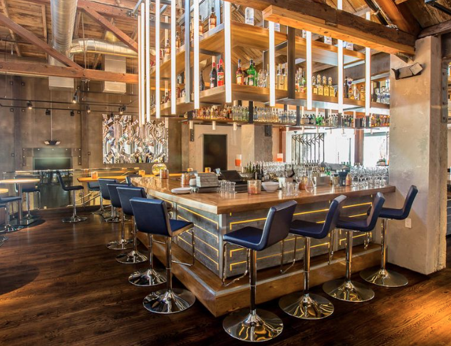 Modern bar at Juniper & Ivy, ideal for networking events and casual meetings.