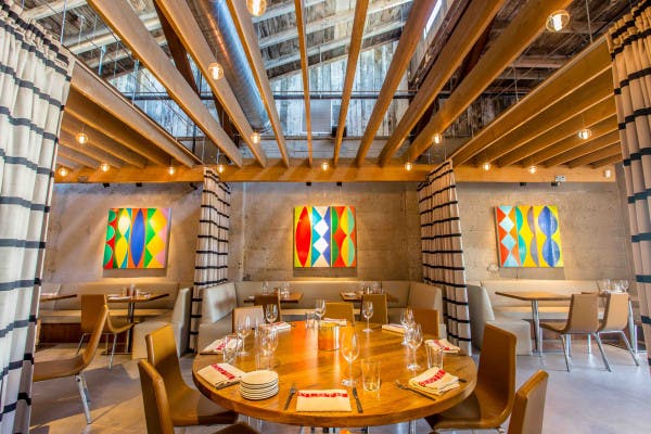 Private dining room at Juniper & Ivy, featuring stylish decor for corporate dinners.