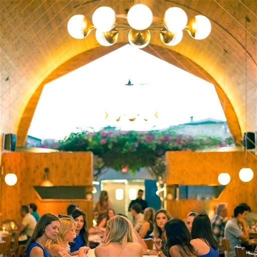 Vibrant dining space at The Kitchen in Madison, ideal for networking events and gatherings.
