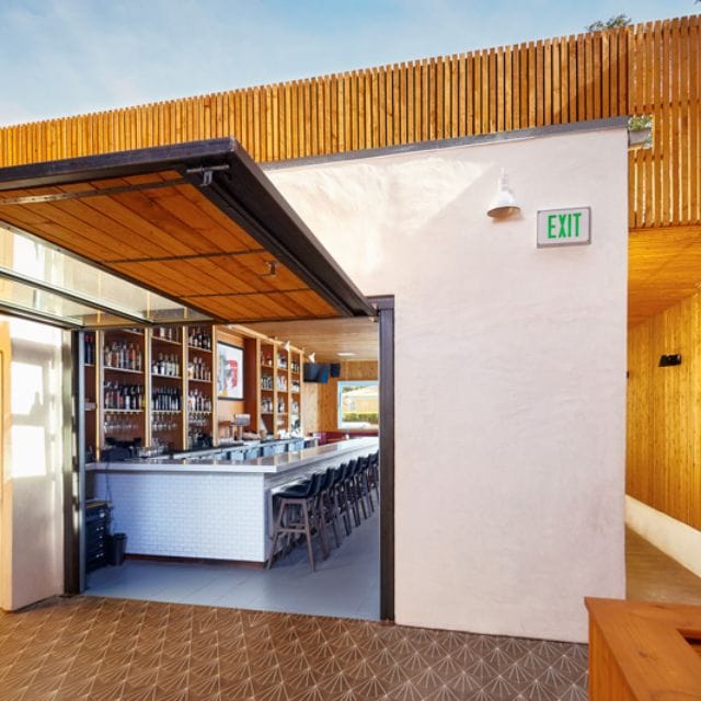 Modern bar area in The Kitchen, Madison; ideal for networking events and social gatherings.