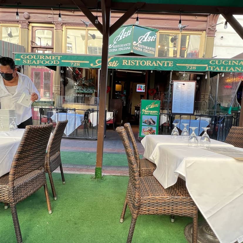 Outdoor dining patio at Asti Ristorante, perfect for casual meetings and events.