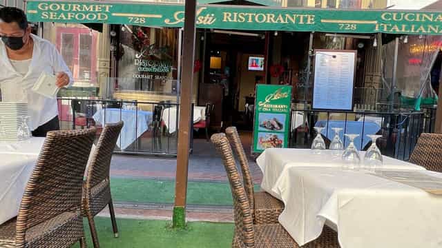 Outdoor dining patio at Asti Ristorante, perfect for casual meetings and events.