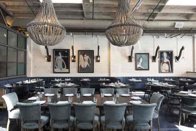 Elegant Lavender Lounge at Herb & Wood, perfect for intimate meetings and events.