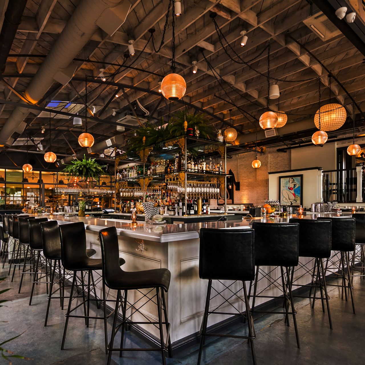 Stylish Lavender Lounge bar at Herb & Wood, perfect for upscale events and mixers.