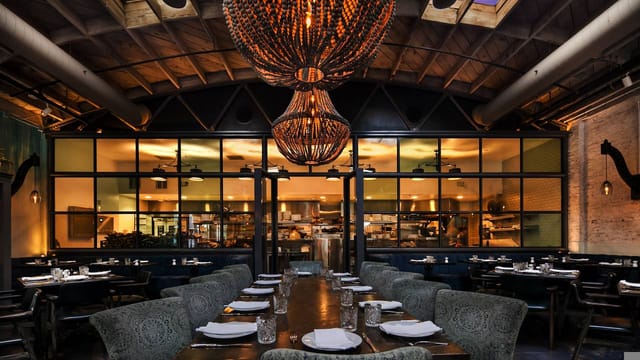 Stylish restaurant kitchen at Herb & Wood, ideal for corporate events and intimate gatherings.