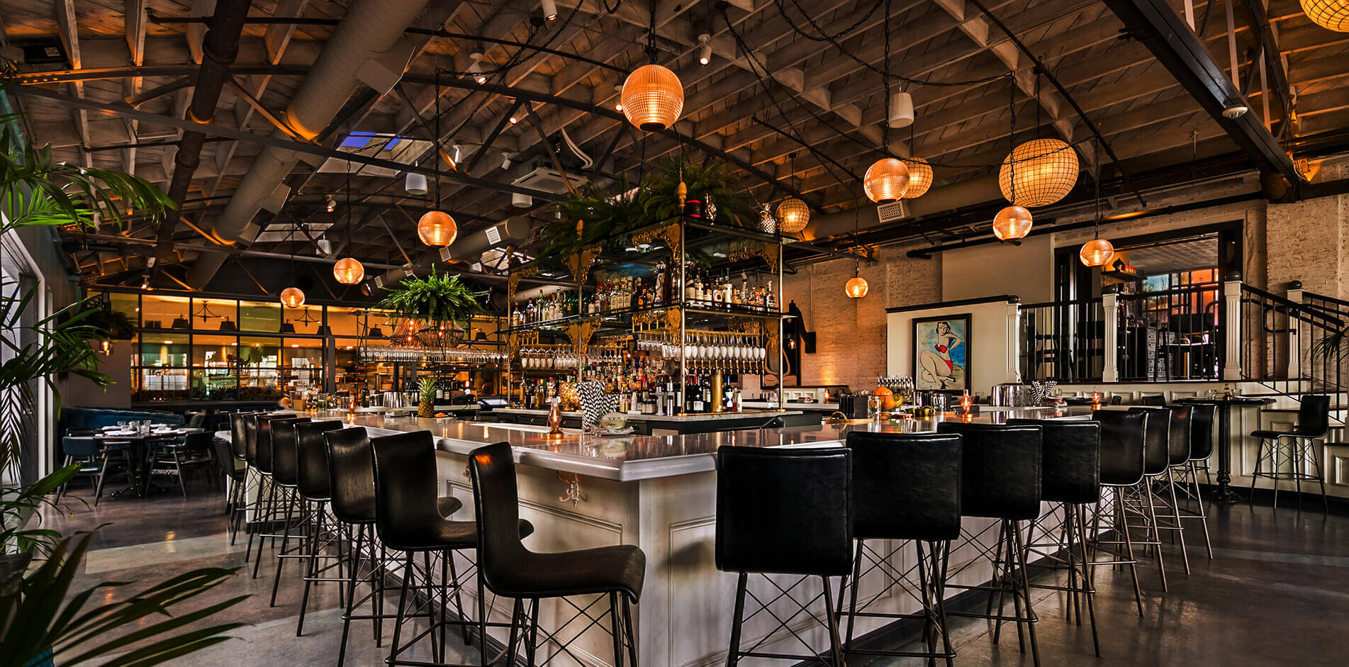Massive Kitchen at Herb & Wood: modern venue with elegant lighting for events.