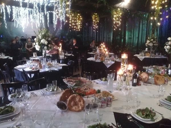 Elegant banquet hall with floral arrangements for sophisticated events.